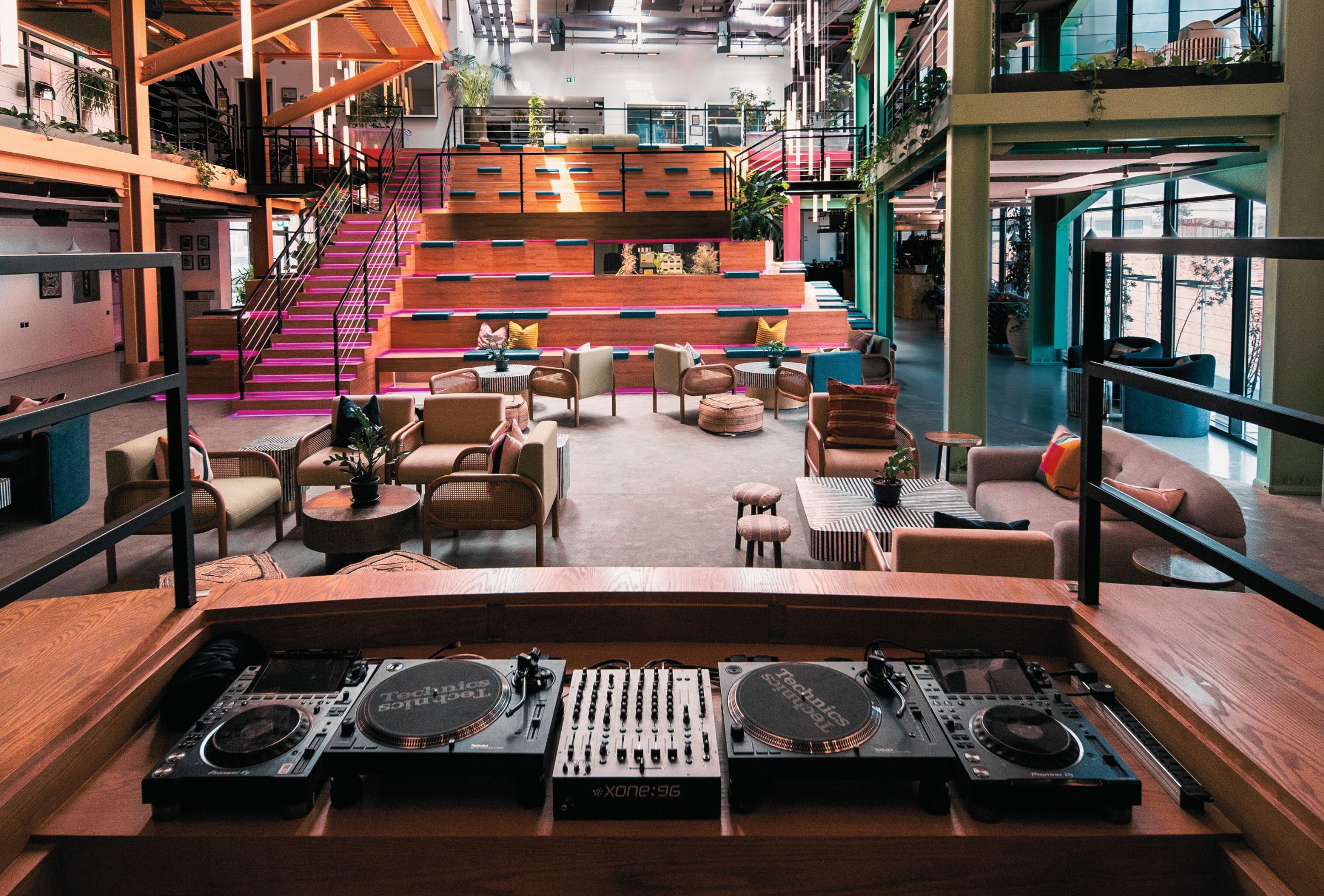Creative event space with DJ booth and seating at MDLBEAST partner project with Creative Hospitality in Saudi Arabia