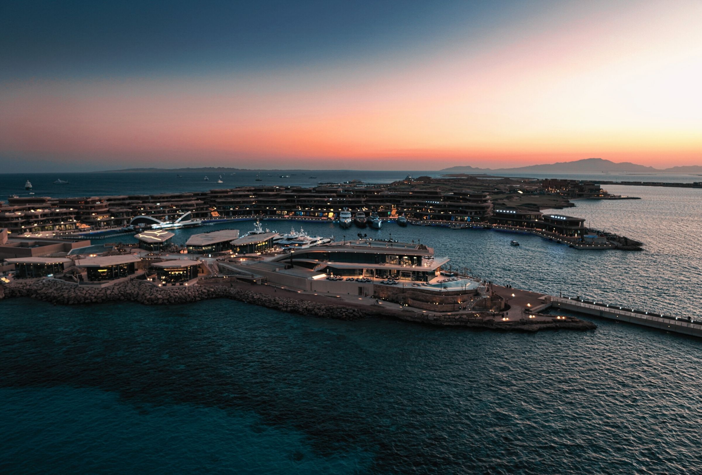 Sunset aerial view of Sindalah Island resort at NEOM, partner project with Creative Hospitality in Saudi Arabia